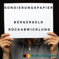 Sondierungspapier CDU - SPD: das wird aus dem Bürgergeld 5 Papier in den Händen