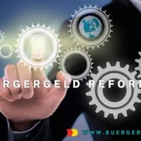 Bürgergeld Reform 2026: Was sich bei Höhe, Zuverdienst und Sanktionen ändert 4 Zahnräder mit Finger daran