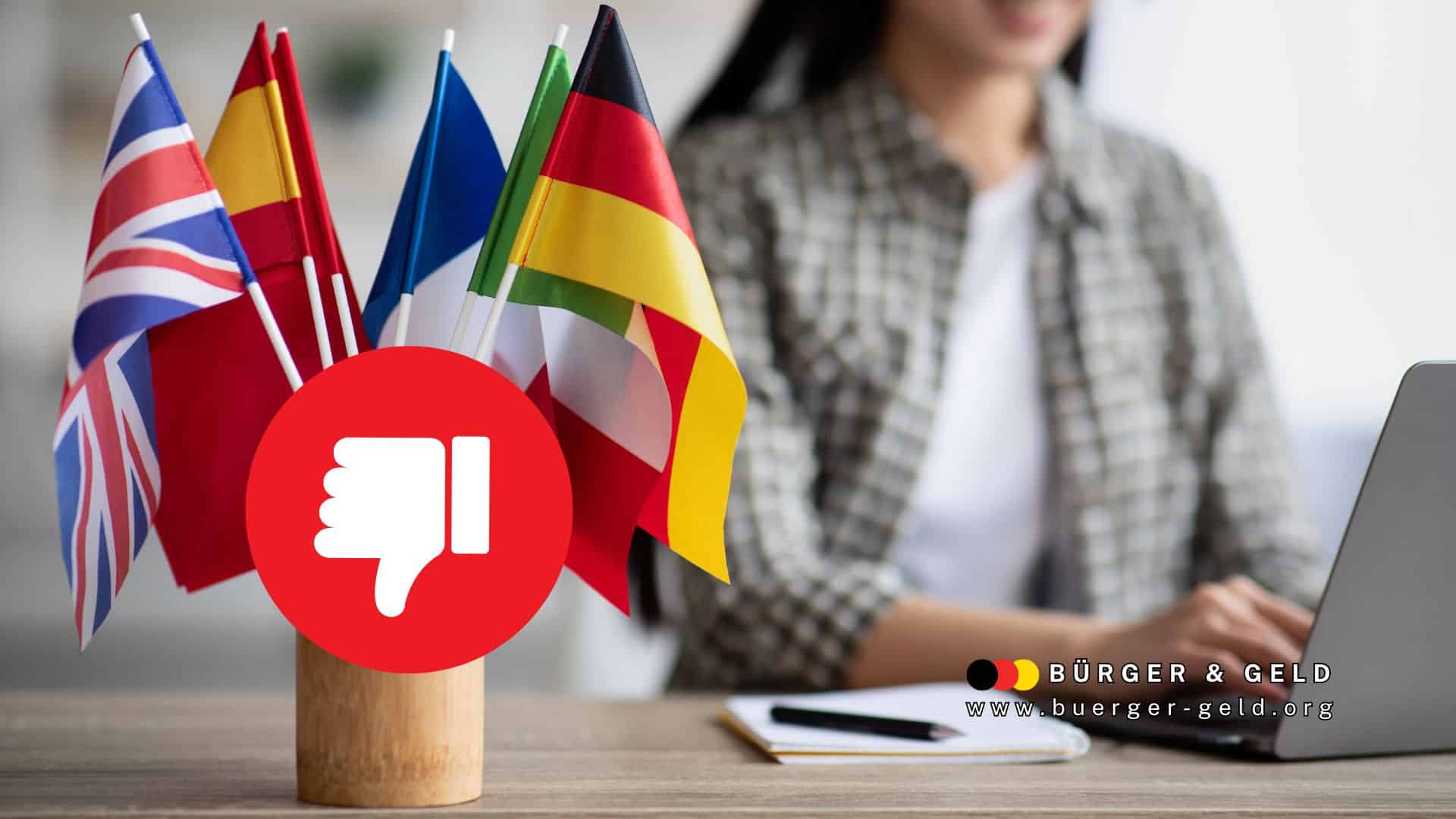 ausländische Fahnen auf Schreibtisch, Symbol Daumen nach unten