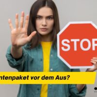 Rentenpaket vor dem Aus: Stoppt die Junge Union das Rentenpaket? 4 Frau mit erhobener Hand und STOP-Schild signalisiert Protest gegen politische Entscheidungen und soziale Einschränkungen